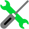 Screwdriver and spanner crossed over each other